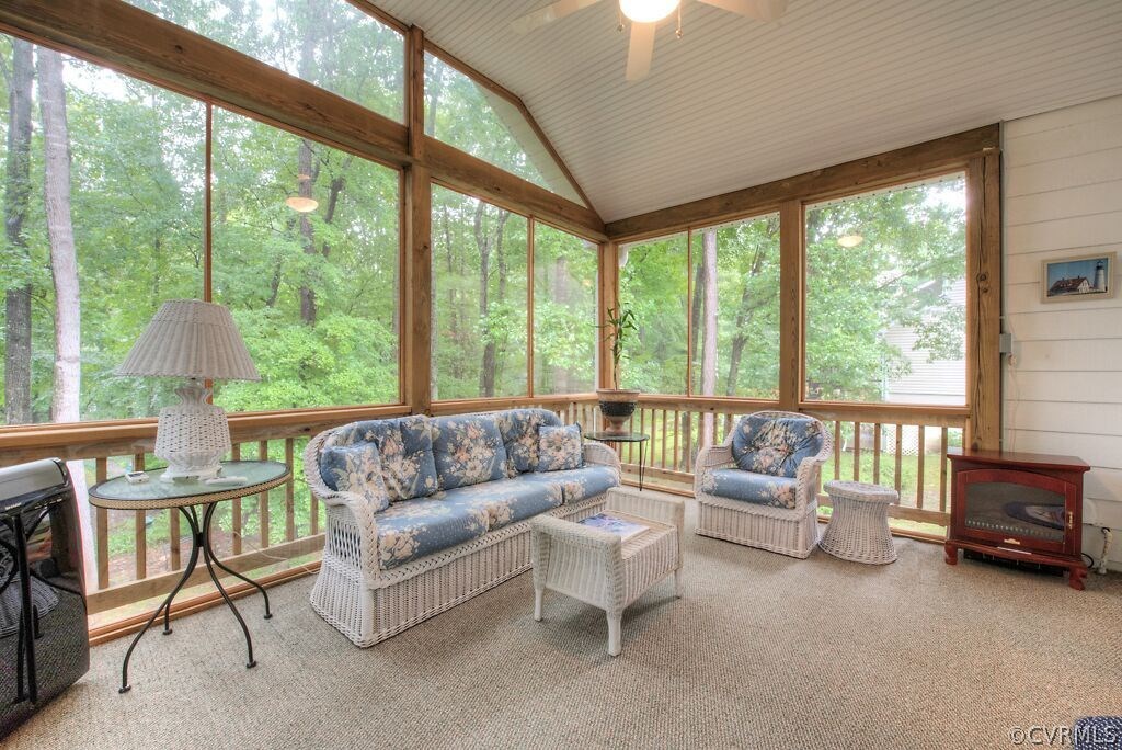 14208 Spring Gate Road Midlothian, VA 23112 - Photo 32 of 44 a living room with furniture and a large window