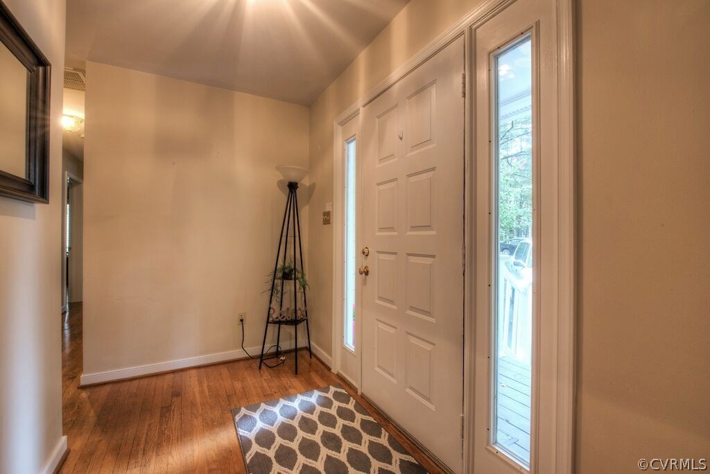 14208 Spring Gate Road Midlothian, VA 23112 - Photo 5 of 44 a view of an entryway with wooden floor
