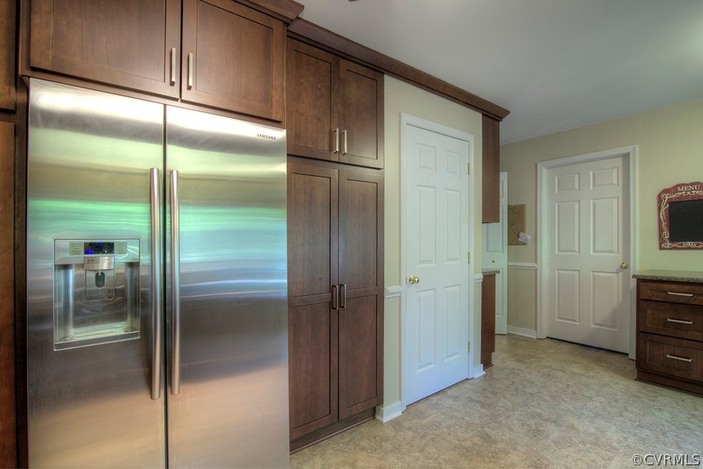 14208 Spring Gate Road Midlothian, VA 23112 - Photo 9 of 44 a kitchen with a refrigerator and a sink