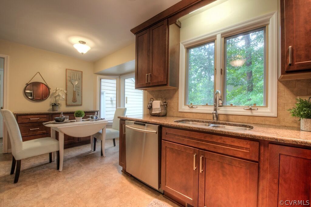 14208 Spring Gate Road Midlothian, VA 23112 - Photo 10 of 44 a kitchen with sink a window and chairs