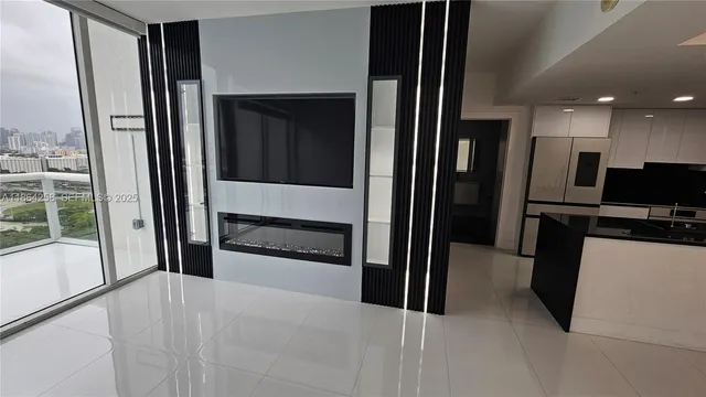 a bathroom with a double vanity sink toilet and a mirror