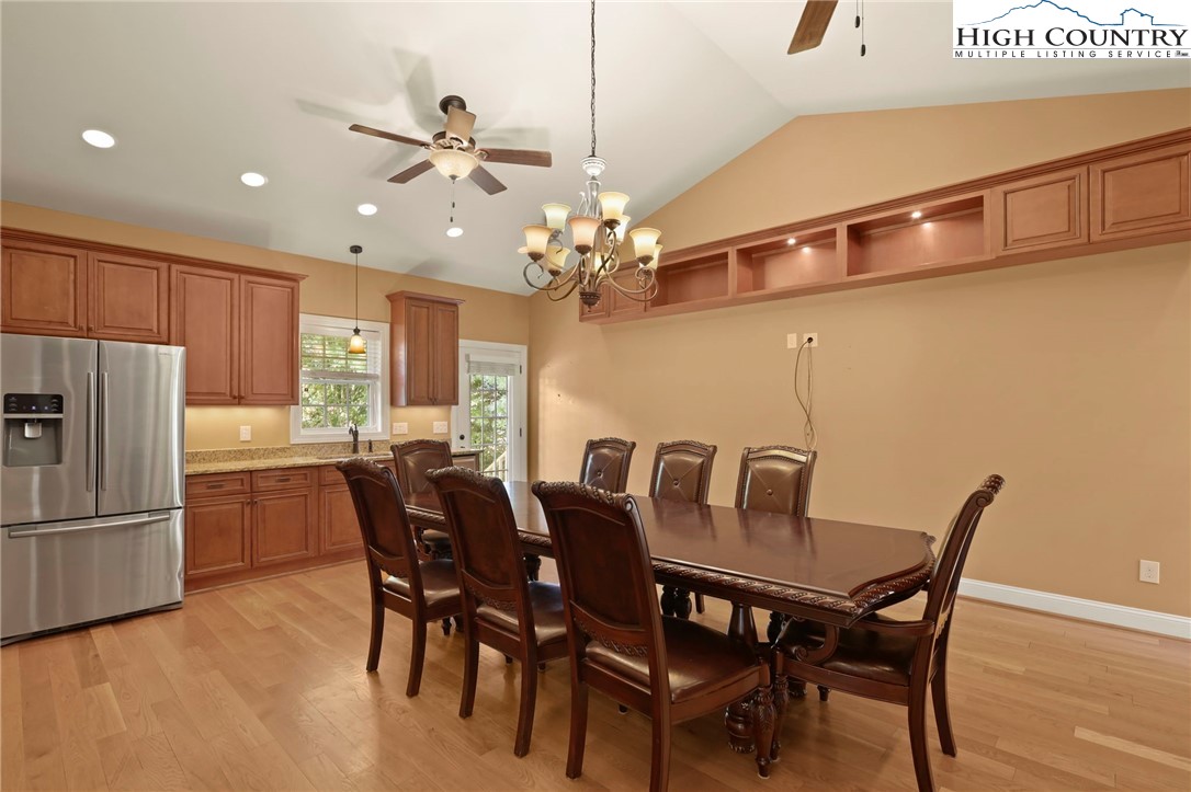 112 Rolling Hill Drive Boone, NC 28607 - Photo 14 of 31 a view of a dining room with furniture and chandelier