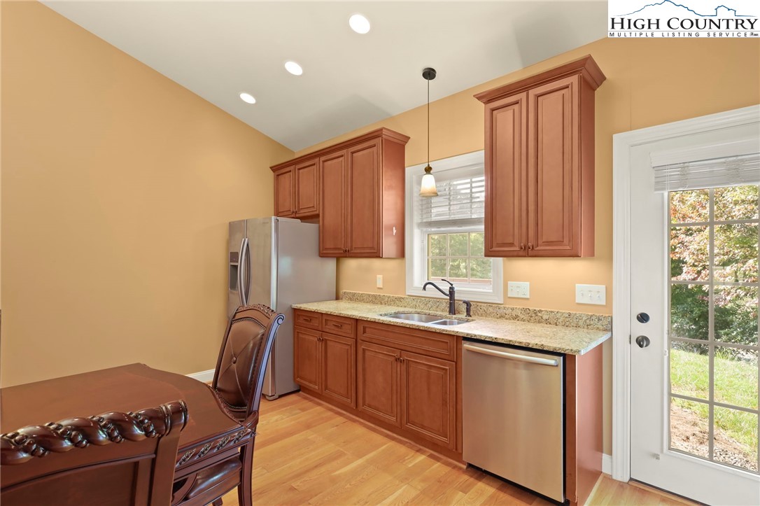 112 Rolling Hill Drive Boone, NC 28607 - Photo 16 of 31 a kitchen that has a sink and a stove in it