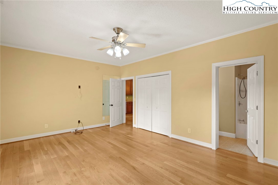 112 Rolling Hill Drive Boone, NC 28607 - Photo 18 of 31 a view of empty room with wooden floor