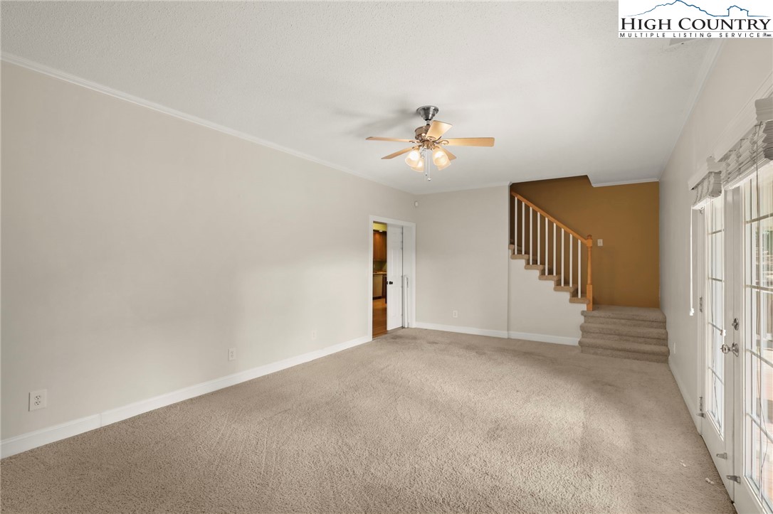 112 Rolling Hill Drive Boone, NC 28607 - Photo 23 of 31 a view of an empty room with a window