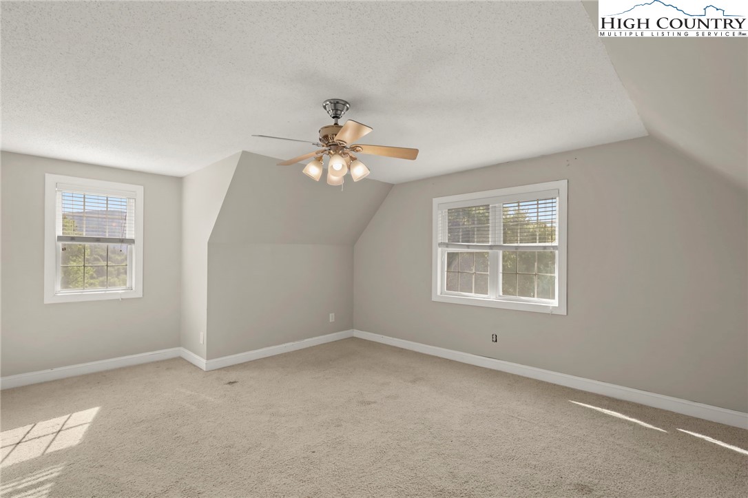 112 Rolling Hill Drive Boone, NC 28607 - Photo 28 of 31 an empty room with a window
