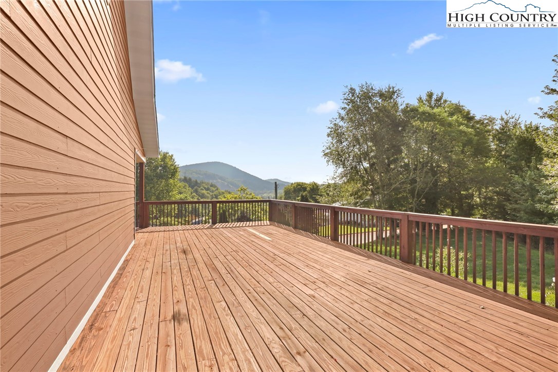 112 Rolling Hill Drive Boone, NC 28607 - Photo 31 of 31 a view of balcony with wooden floor and fence