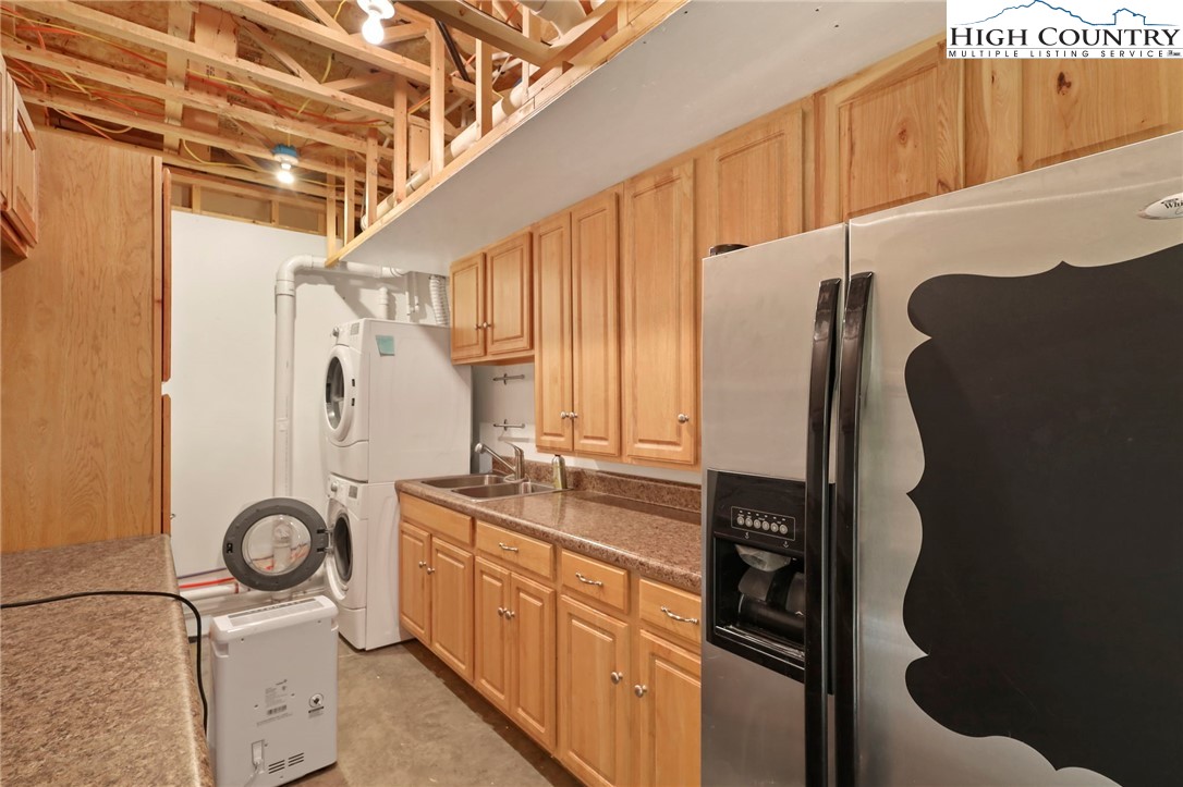 112 Rolling Hill Drive Boone, NC 28607 - Photo 10 of 31 a kitchen with stainless steel appliances granite countertop a refrigerator and a stove