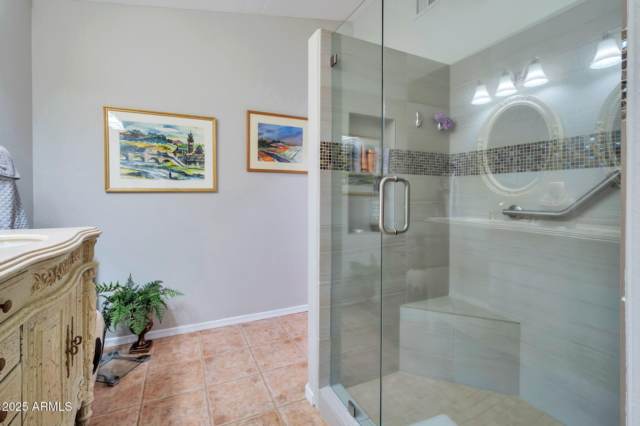 15460 West Merrell Street Goodyear, AZ 85395 - Photo 18 of 30 a bathroom with a shower