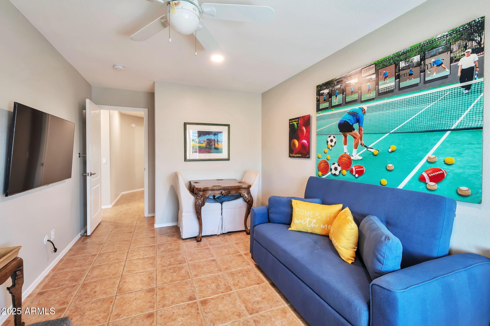 15460 West Merrell Street Goodyear, AZ 85395 - Photo 21 of 30 a living room with furniture and a couch