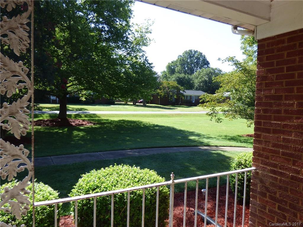 5229 Manning Road Charlotte, NC 28269 - Photo 6 of 18 a view of a pathway with a yard