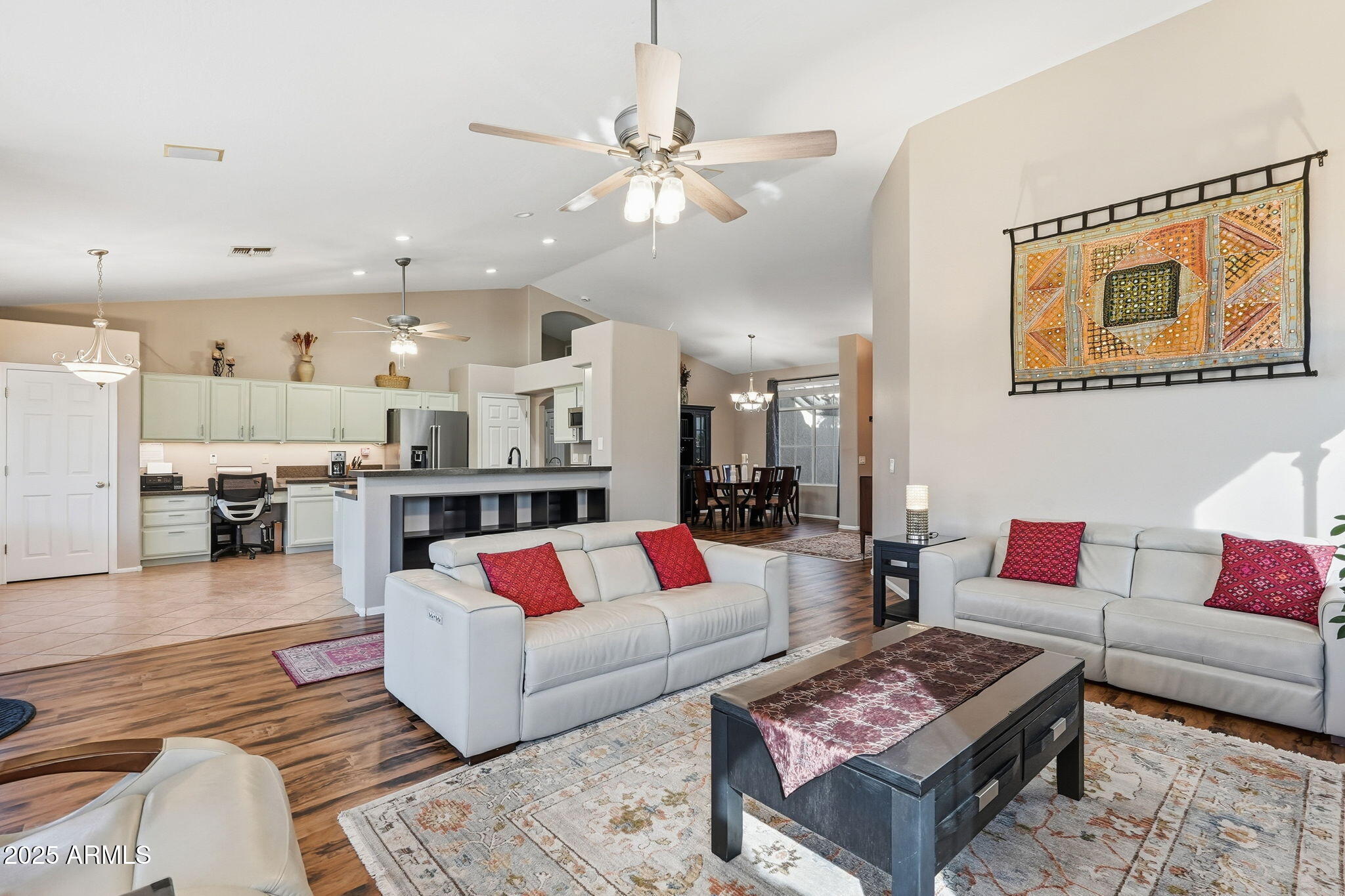 7137 East Laguna Azul Avenue Mesa, AZ 85209 - Photo 12 of 58 a living room with furniture and a rug