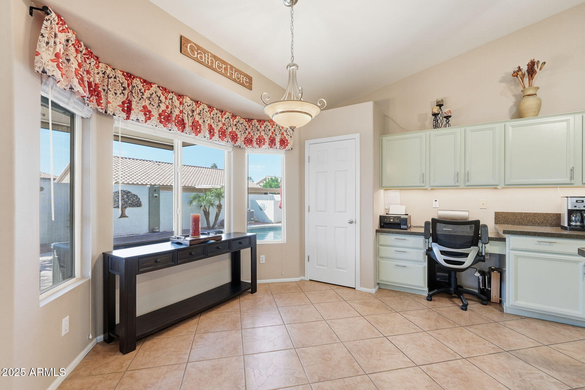 7137 East Laguna Azul Avenue Mesa, AZ 85209 - Photo 20 of 58 a open kitchen with cabinets and stainless steel appliances