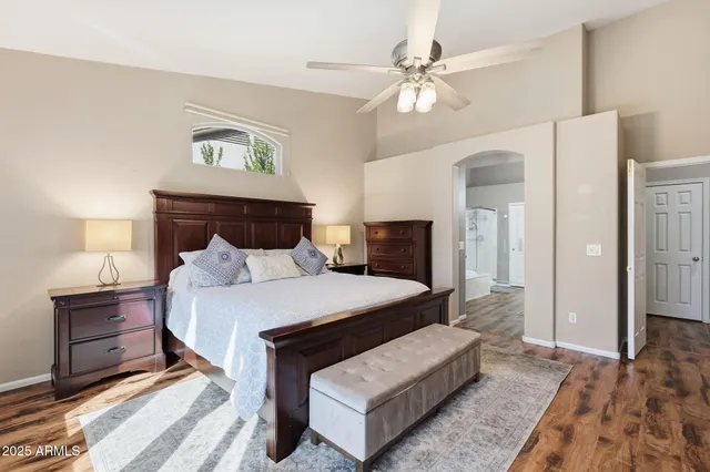 a white bath tub sitting next to a white sink