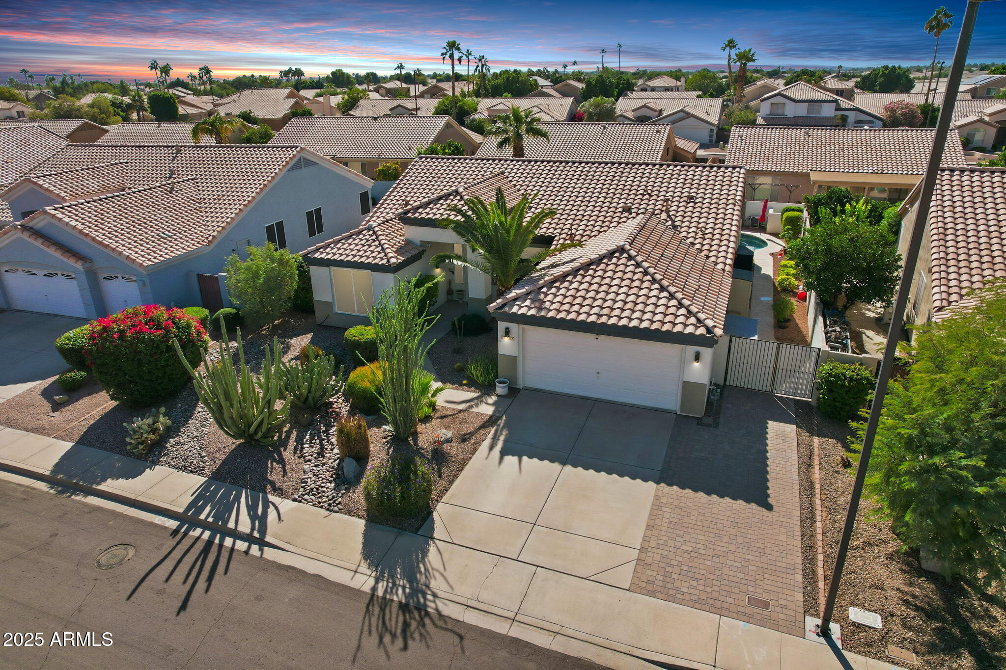 7137 East Laguna Azul Avenue Mesa, AZ 85209 - Photo 55 of 58 an aerial view of a house with garden space and street view