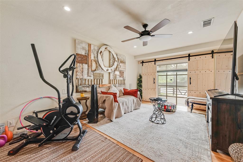 10605 Ferguson Road Dallas, TX 75228 - Photo 16 of 27 a view of a room with gym equipment