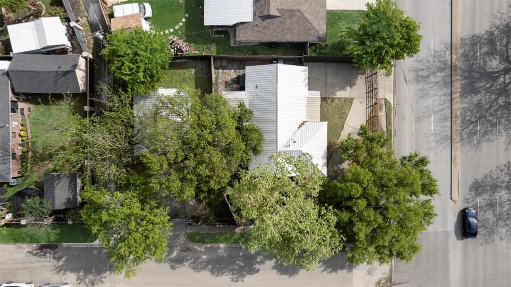 10605 Ferguson Road Dallas, TX 75228 - Photo 24 of 27 an aerial view of a house with a yard and fountain
