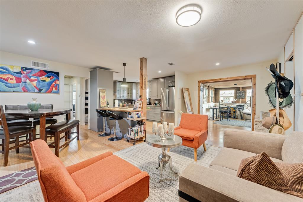 10605 Ferguson Road Dallas, TX 75228 - Photo 6 of 27 a living room with furniture and a flat screen tv
