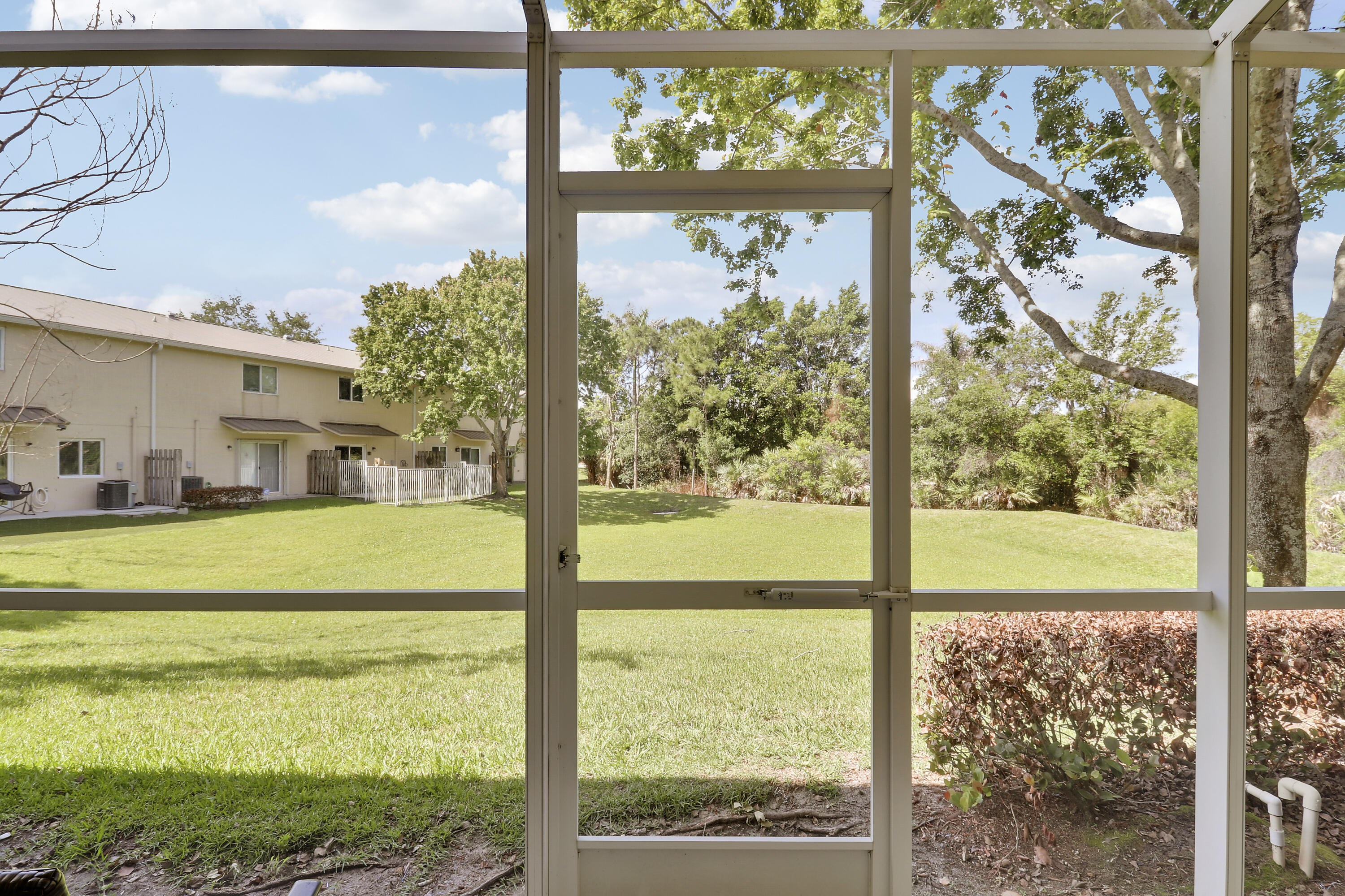 5410 Southeast Mitchell Lane Stuart, FL 34997 - Photo 5 of 24 a view of a room with a large window