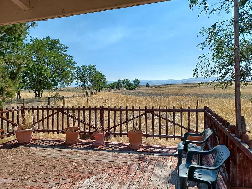557-435 Center School House Road Bieber, CA 96009 - Photo 6 of 24 a view of a roof deck with wooden floor and fence