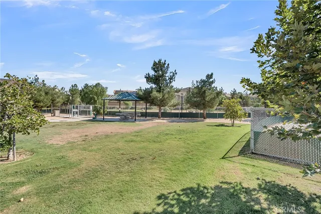 a view of a playground with houses
