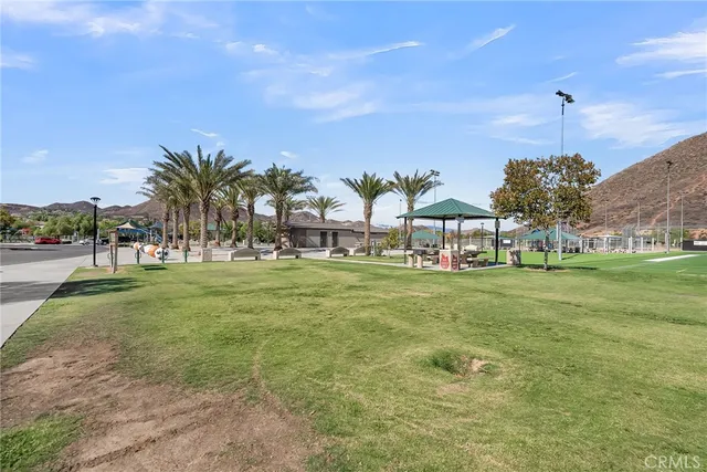 a view of a garden with houses