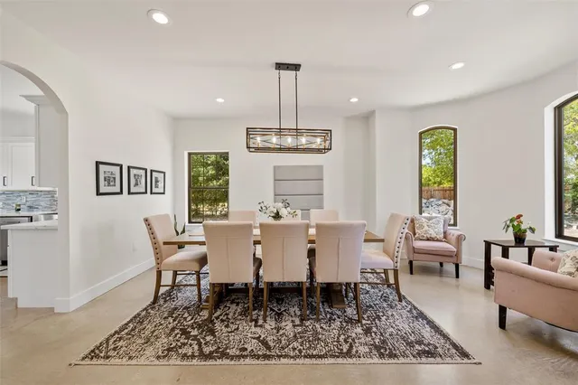 a bedroom with a bed and a tv