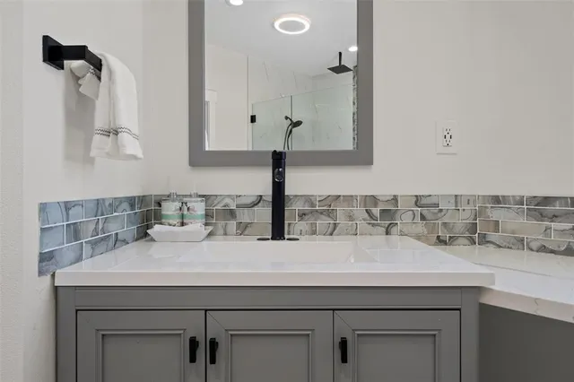 a view of a road with a building in the background