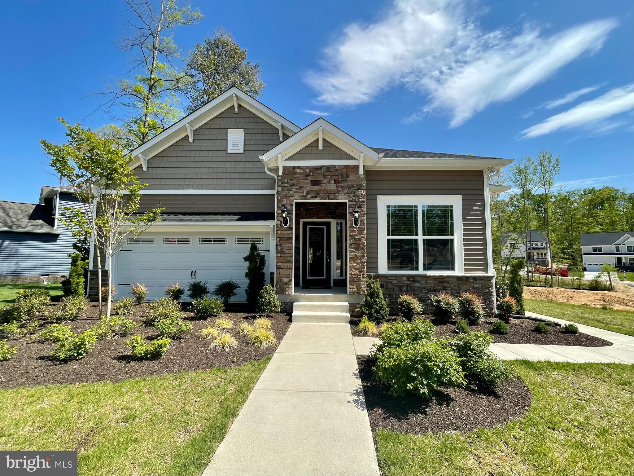 Stunning 1 story with a beautiful landscaped yard.