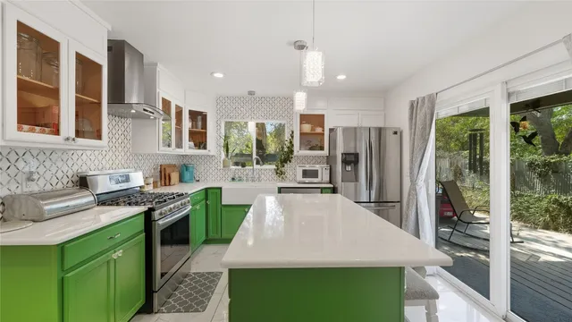 a dining room with a table and chairs