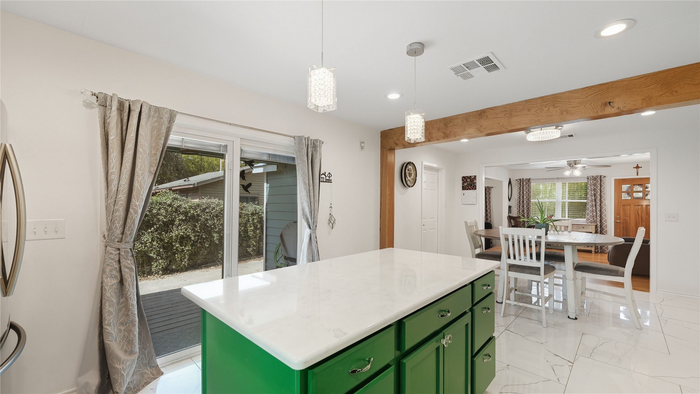 6503 Lynch Lane Austin, TX 78741 - Photo 7 of 38 a view of a dining table and chairs in a room