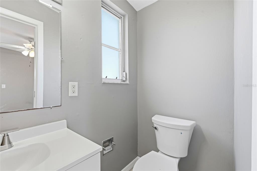 363 Glen Oak Road Venice, FL 34293 - Photo 46 of 53 a white toilet sitting next to a white sink