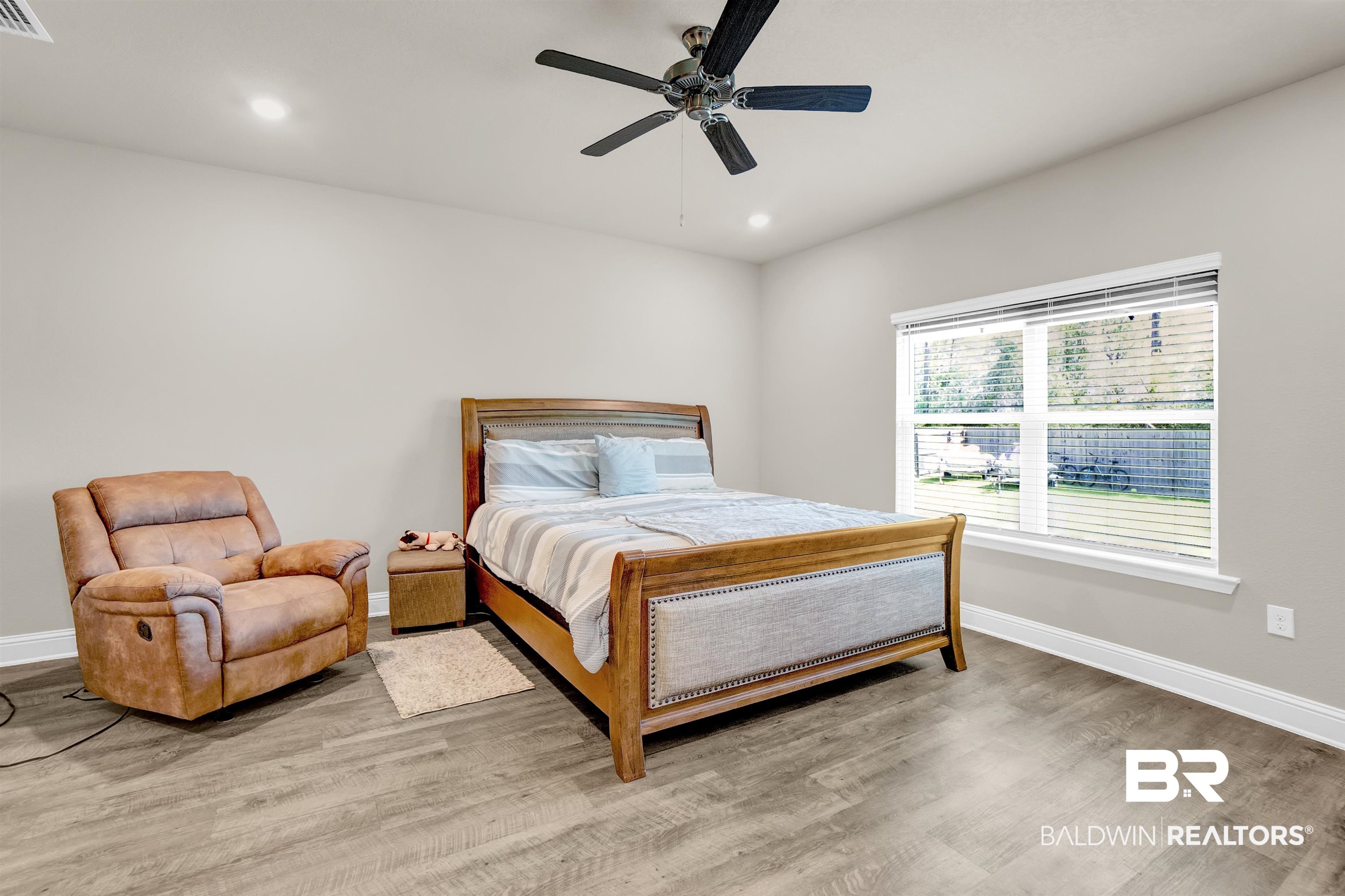 31671 Memphis Loop Daphne, AL 36527 - Photo 25 of 51 Bedroom with a ceiling fan, recessed lighting, baseboards, and wood finished floors