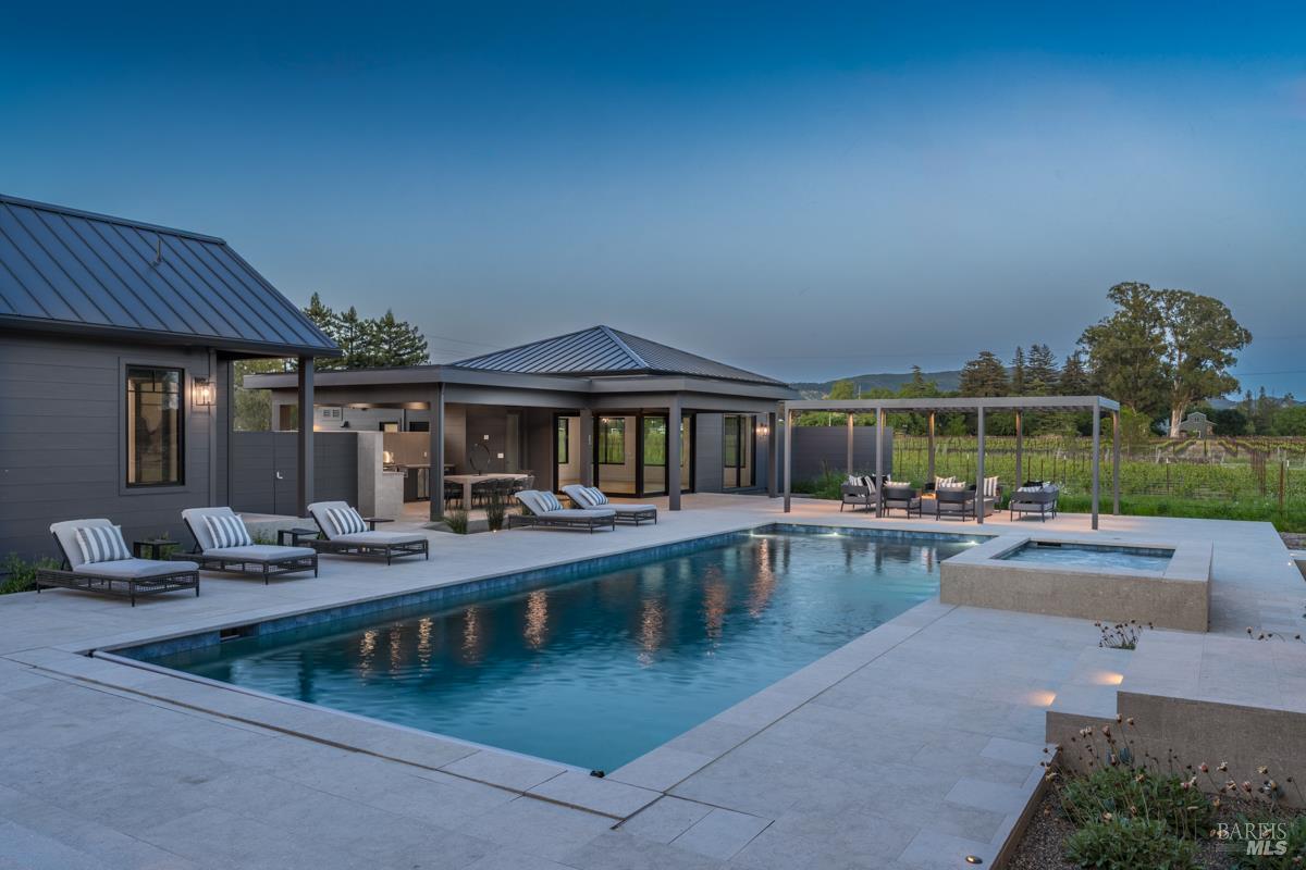 601 Napa Road Sonoma, CA 95476 - Photo 8 of 14 a view of a house with swimming pool and sitting area