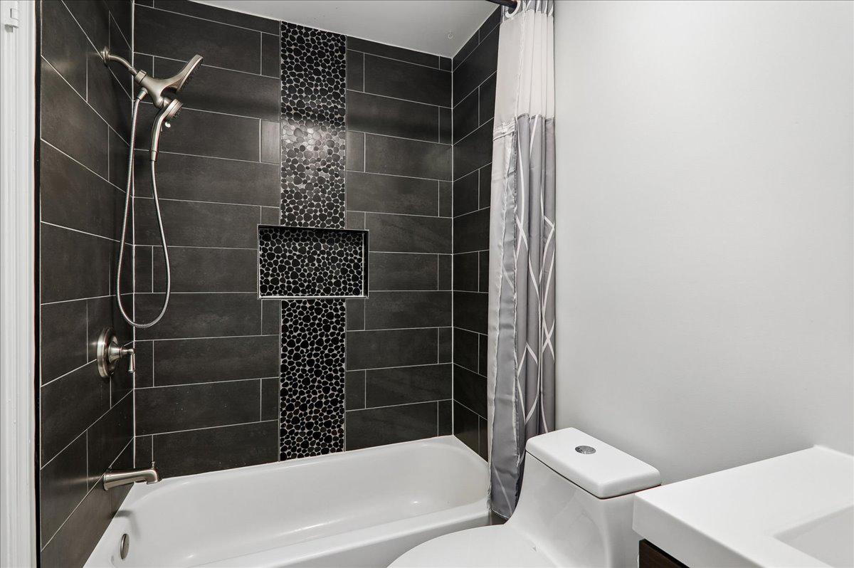 7408 Spring Tree Drive Springfield, VA 22153 - Photo 23 of 48 Updated tiled shower/tub