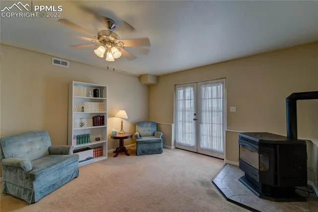 a view of a livingroom with furniture and entryway