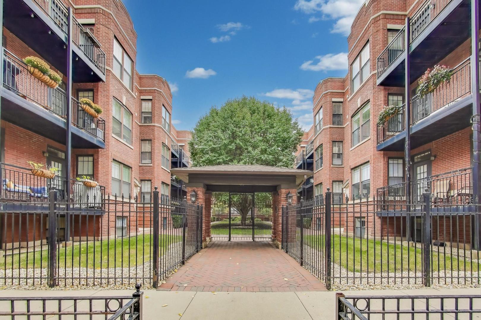 a view of a brick building from a balcony
