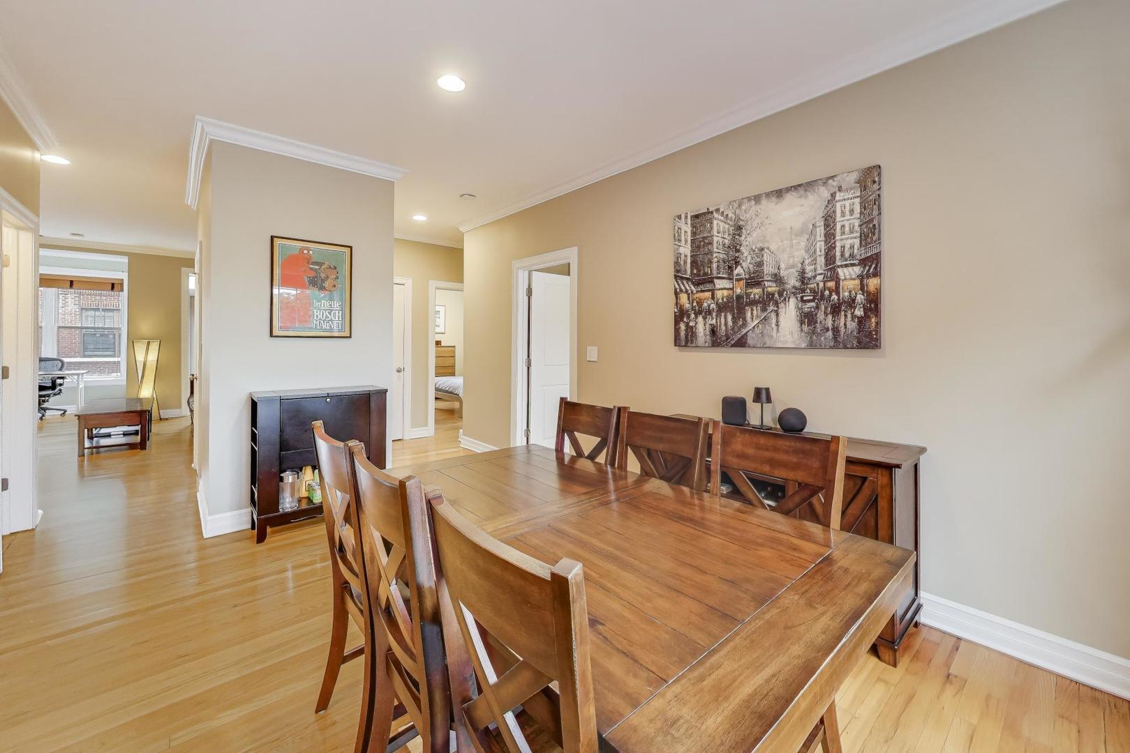 2711 North Mildred Avenue, Unit 3A Chicago, IL 60614 - Photo 13 of 27 a view of a dining room with furniture and wooden floor