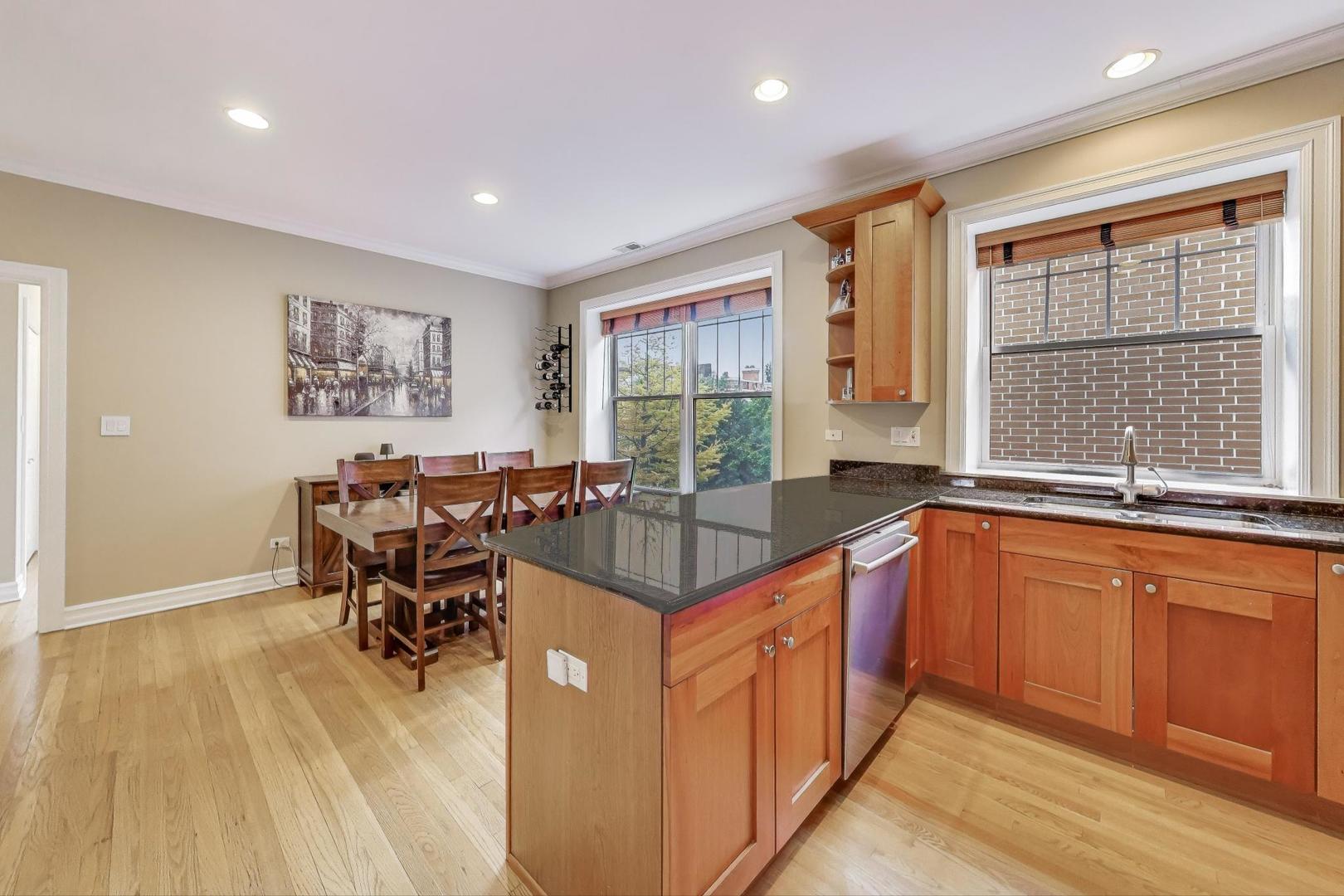 2711 North Mildred Avenue, Unit 3A Chicago, IL 60614 - Photo 14 of 27 a very nice looking kitchen with a large window
