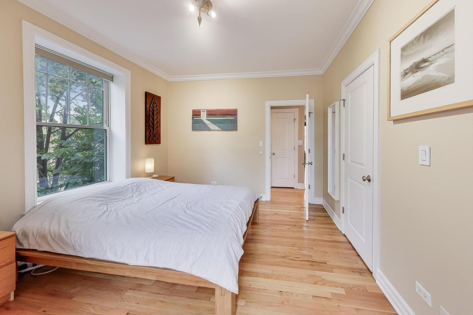 2711 North Mildred Avenue, Unit 3A Chicago, IL 60614 - Photo 18 of 27 a bedroom with bed and window