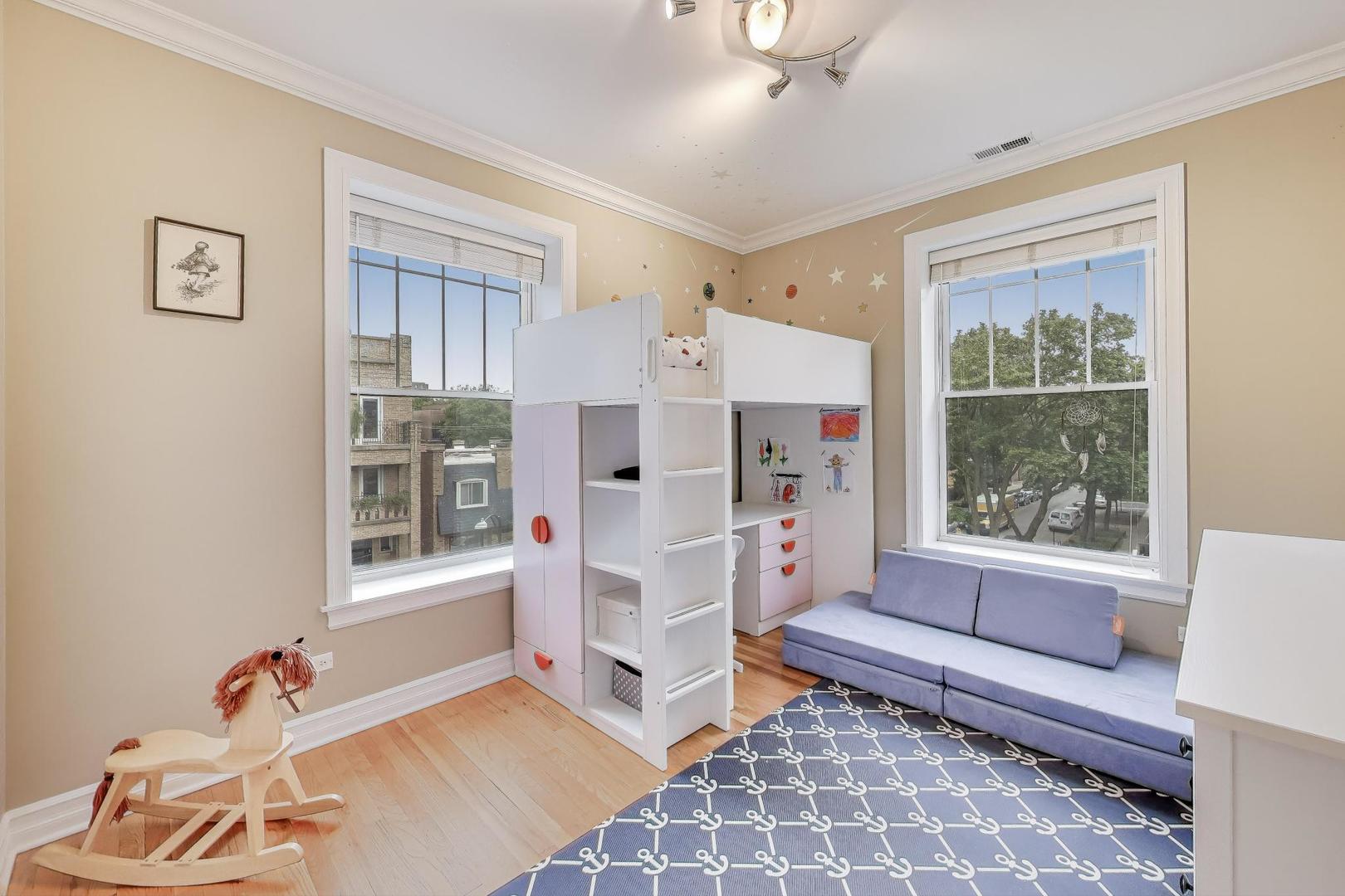 2711 North Mildred Avenue, Unit 3A Chicago, IL 60614 - Photo 20 of 27 a living room with furniture and a window