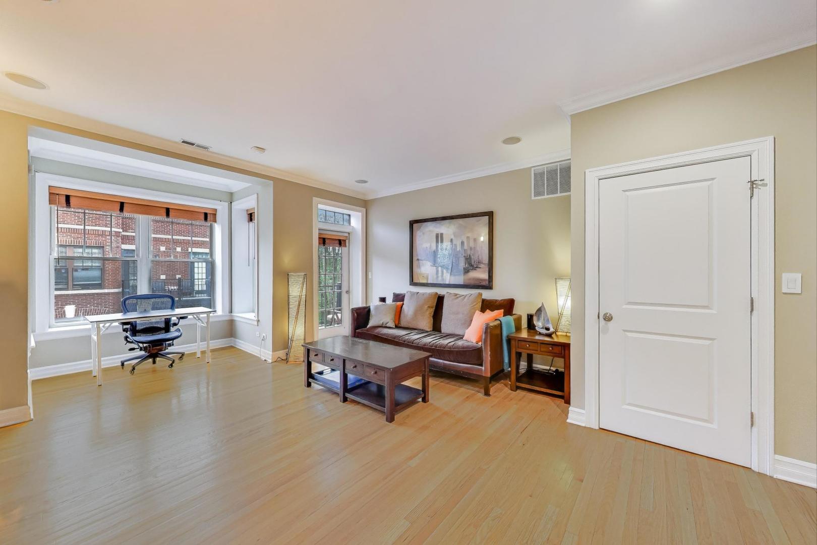 2711 North Mildred Avenue, Unit 3A Chicago, IL 60614 - Photo 4 of 27 a living room with furniture and a wooden floor