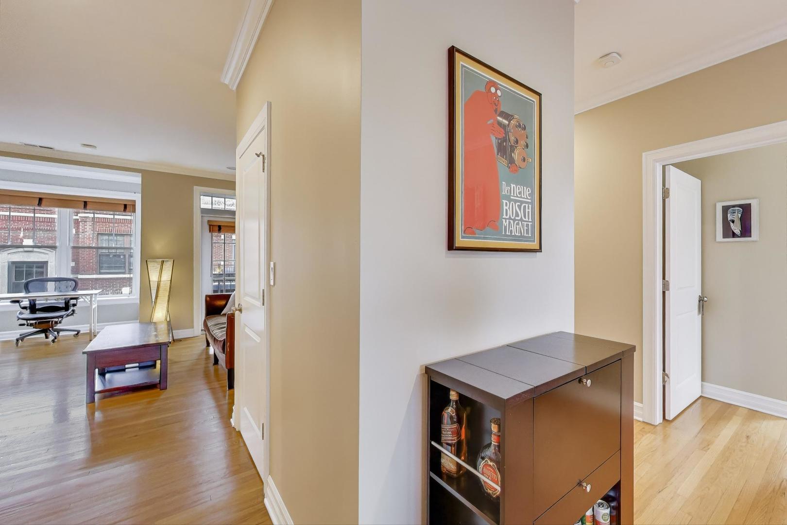 2711 North Mildred Avenue, Unit 3A Chicago, IL 60614 - Photo 10 of 27 a living room with furniture and wooden floor