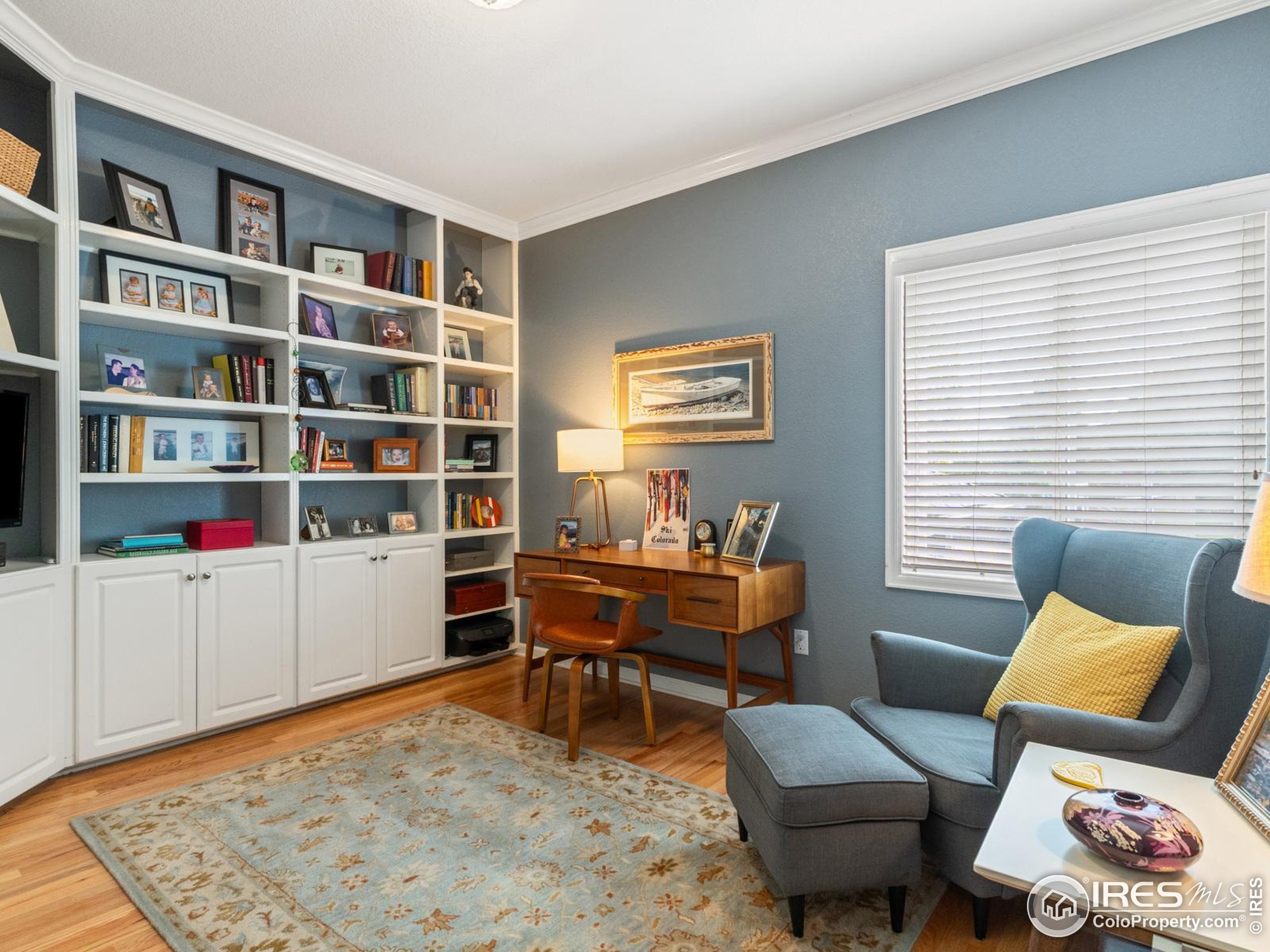 234 Mohawk Drive Boulder, CO 80303 - Photo 12 of 49 a reading room with furniture and a book shelf