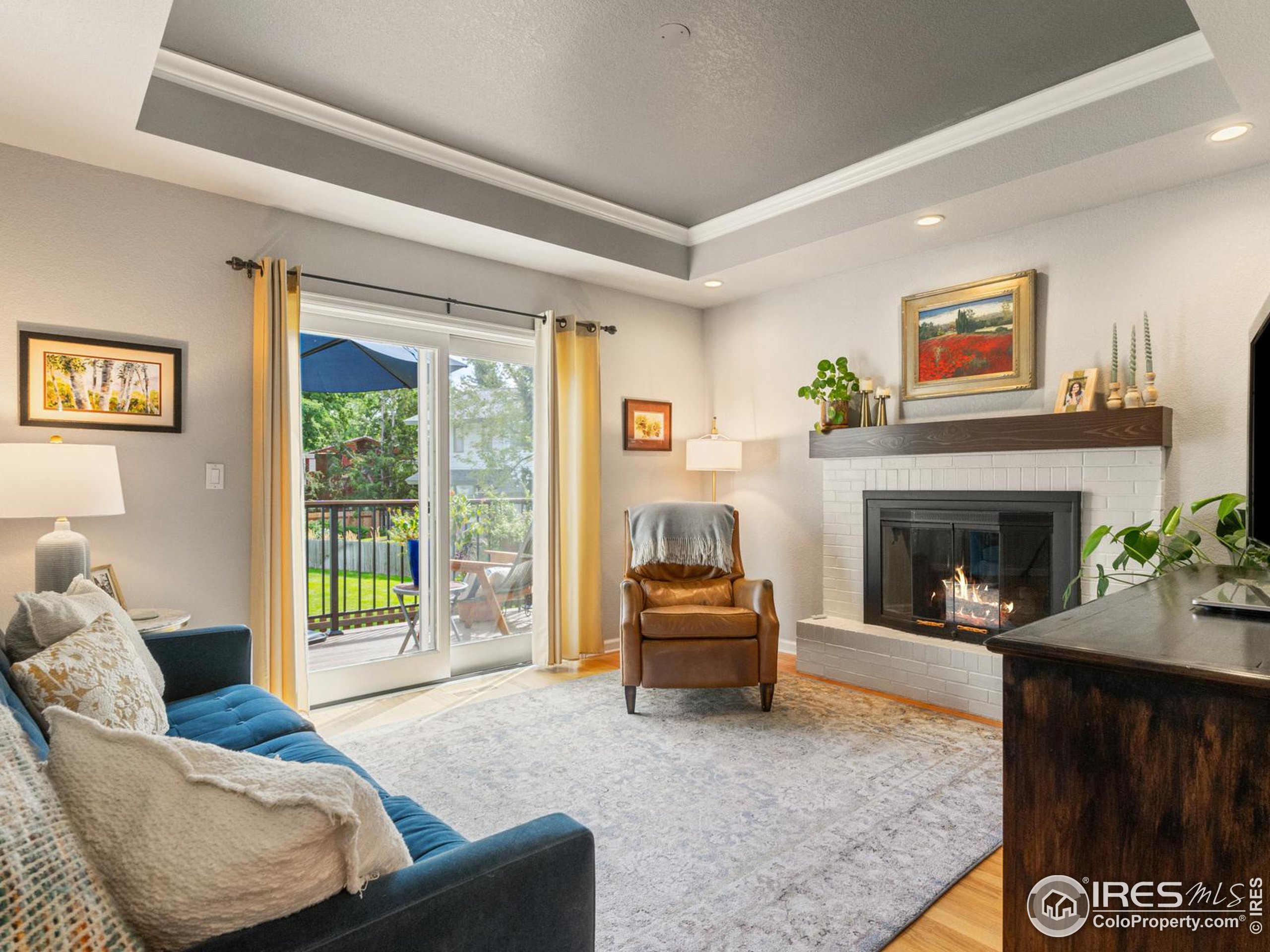234 Mohawk Drive Boulder, CO 80303 - Photo 14 of 49 a living room with furniture and a fireplace