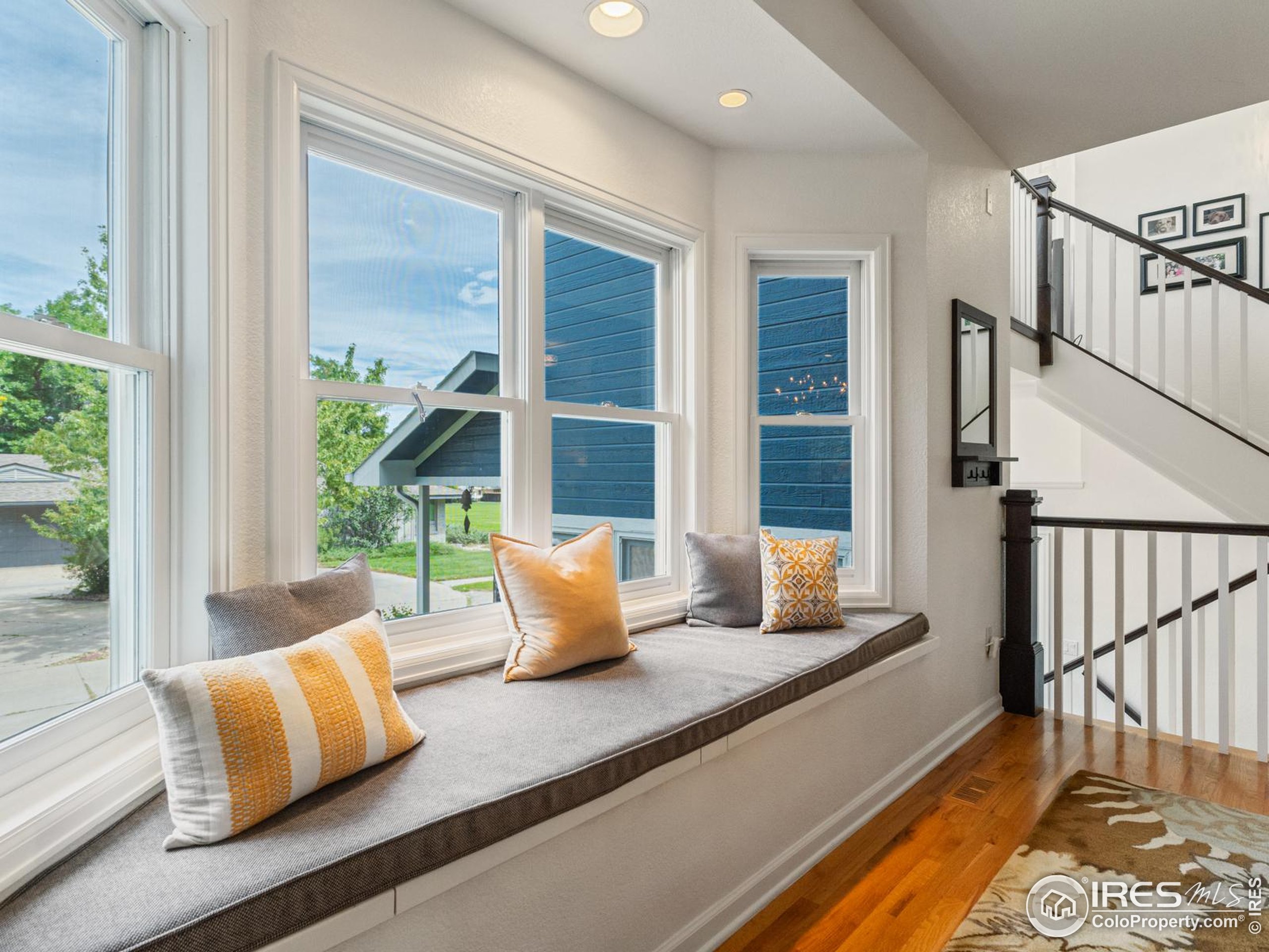 234 Mohawk Drive Boulder, CO 80303 - Photo 17 of 49 a bedroom with furniture and a large window