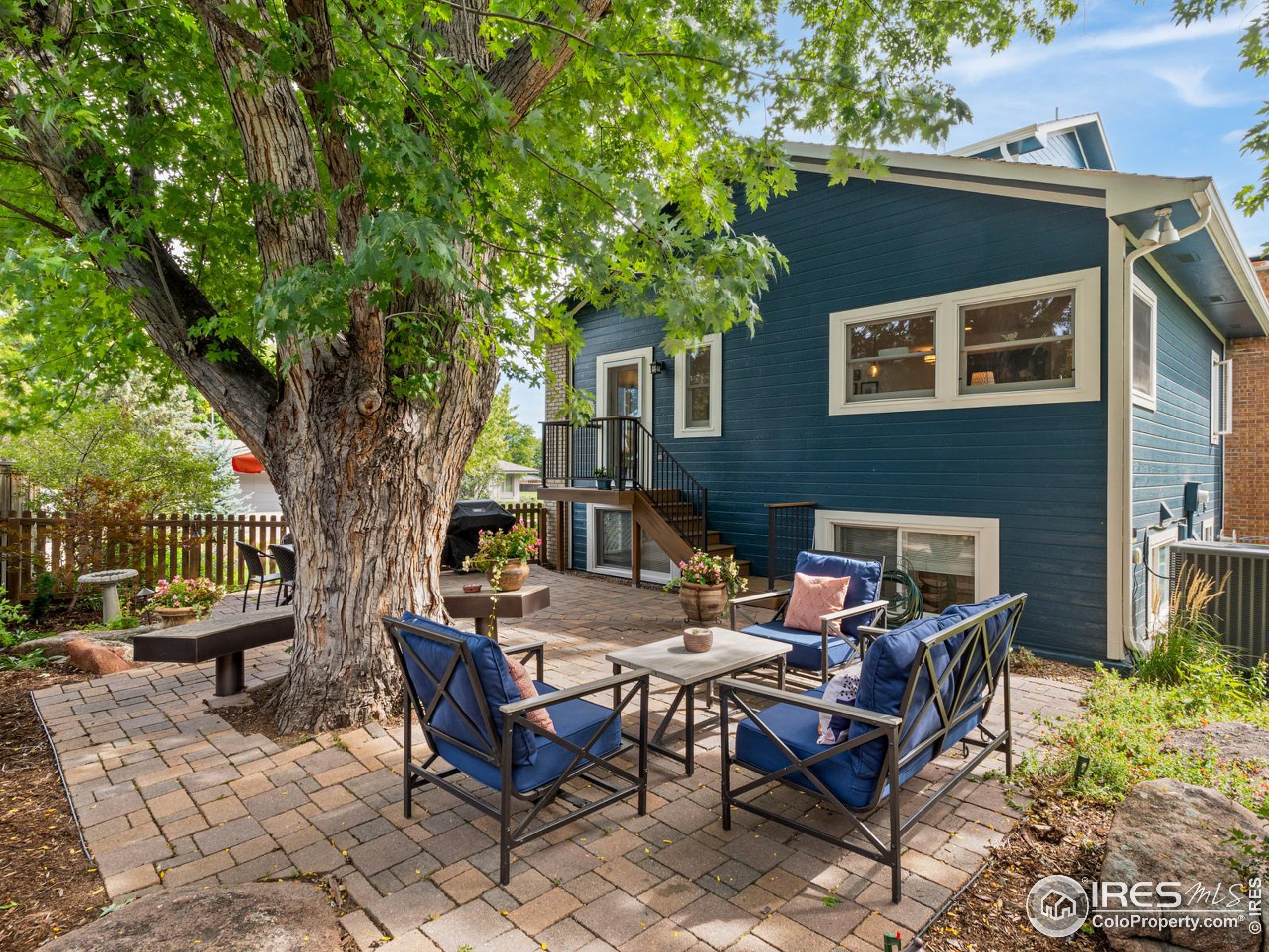 234 Mohawk Drive Boulder, CO 80303 - Photo 25 of 49 a backyard of a house with outdoor seating