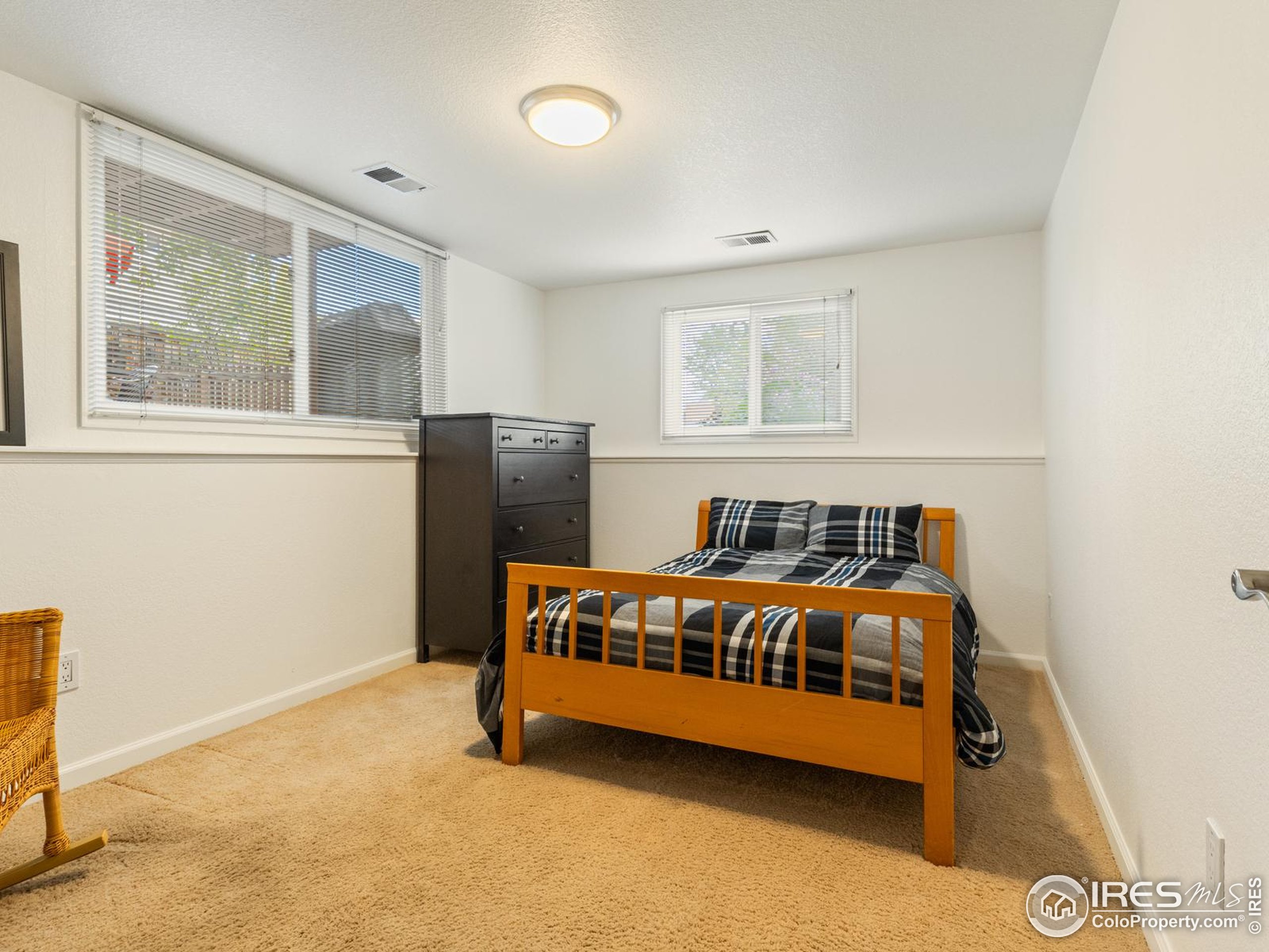 234 Mohawk Drive Boulder, CO 80303 - Photo 33 of 49 a bedroom with a bed and window