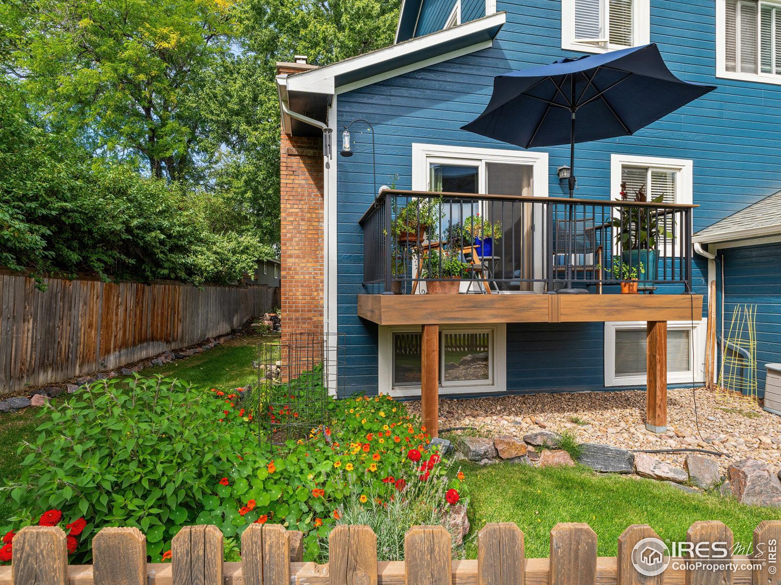 234 Mohawk Drive Boulder, CO 80303 - Photo 34 of 49 a front view of a house with garden