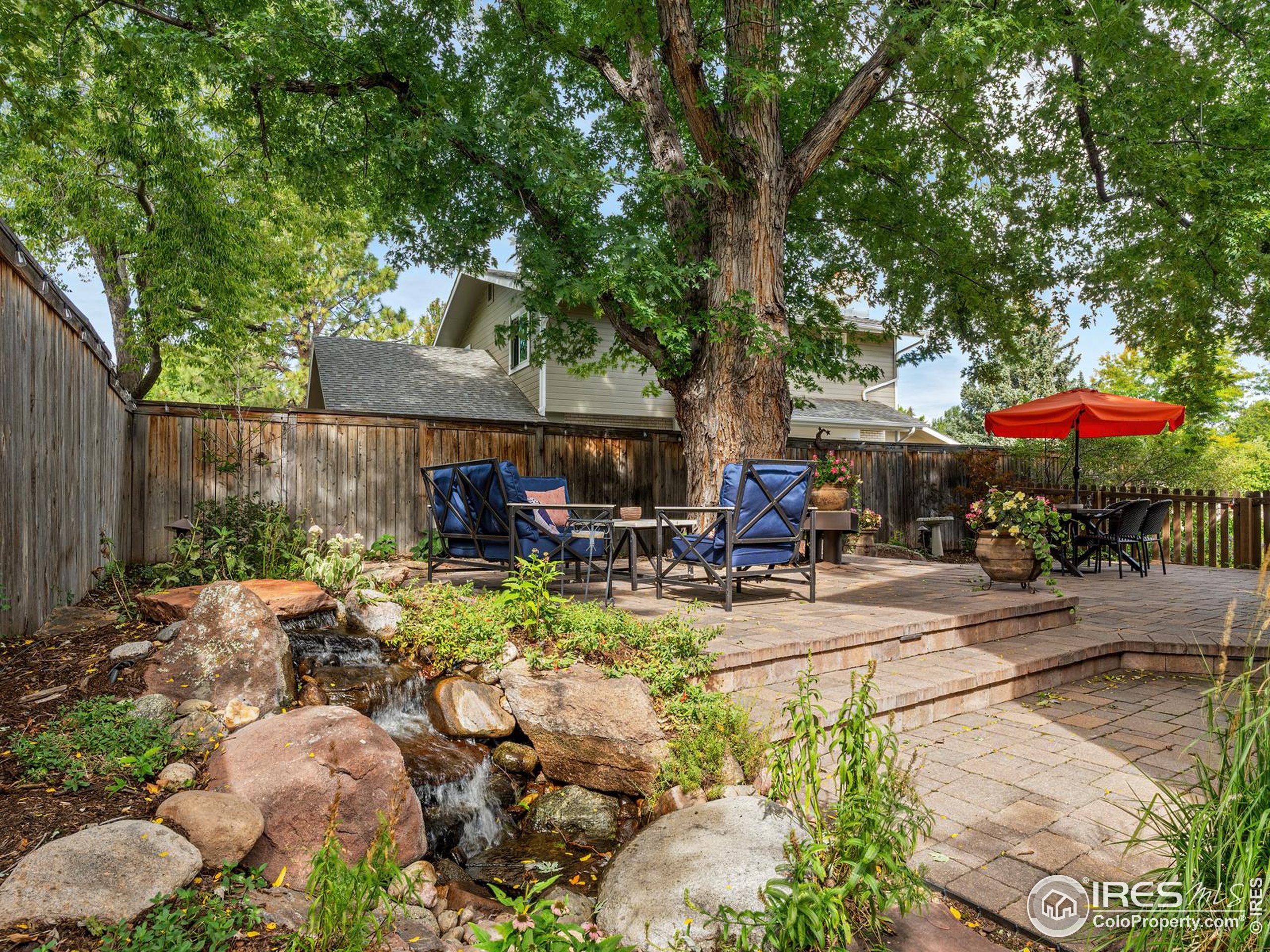 234 Mohawk Drive Boulder, CO 80303 - Photo 36 of 49 a view of a backyard with sitting area and furniture